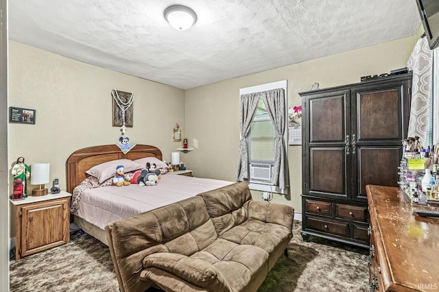 719 W Franklin St, Elkhart, IN 46516 - carpeted bedroom featuring a textured ceiling