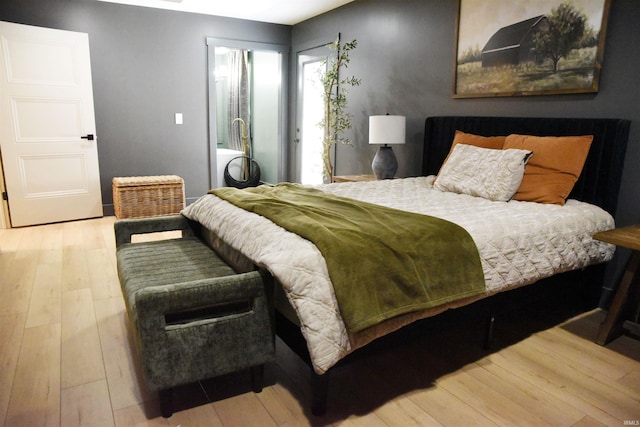 545 Bennett Rd, Bedford, IN 47421 - bedroom featuring wood finished floors and access to exterior