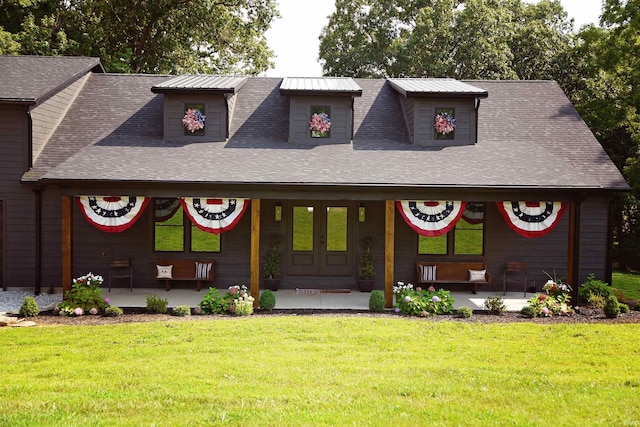 545 Bennett Rd, Bedford, IN 47421 - view of front of property with covered porch, a front yard, and roof with shingles