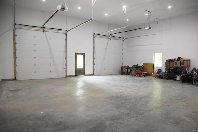 545 Bennett Rd, Bedford, IN 47421 - garage with a garage door opener and recessed lighting