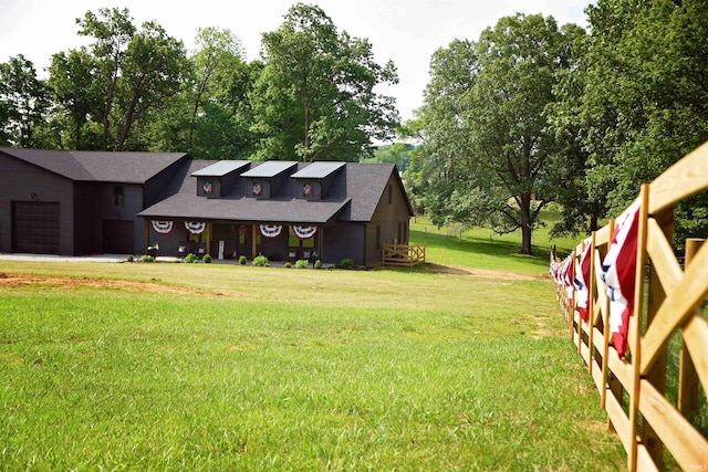 545 Bennett Rd, Bedford, IN 47421 - view of grassy yard with a garage and driveway