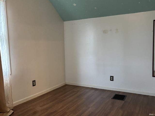 4026 S Lafayette St, Fort Wayne, IN 46806 - empty room featuring wood finished floors, vaulted ceiling, and baseboards
