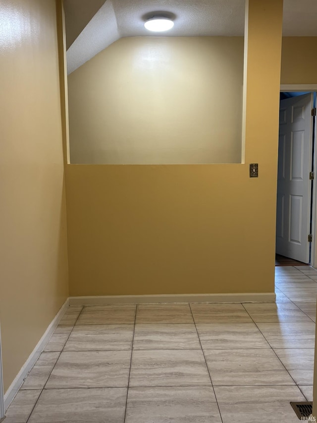 4026 S Lafayette St, Fort Wayne, IN 46806 - corridor with a textured ceiling and baseboards