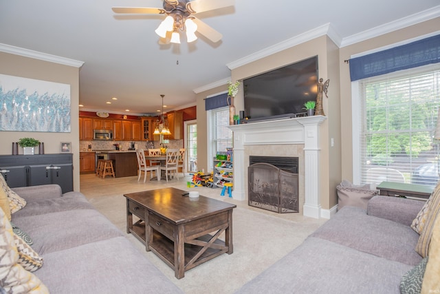 9076 Halston Cir, Newburgh, IN 47630 - living area with a ceiling fan, crown molding, and a tiled fireplace