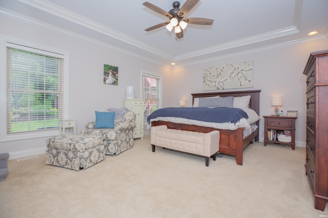 9076 Halston Cir, Newburgh, IN 47630 - bedroom with light colored carpet, crown molding, ceiling fan, baseboards, and a tray ceiling
