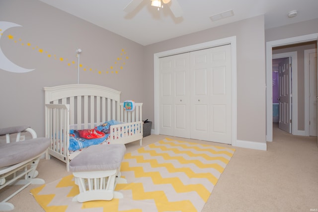 9076 Halston Cir, Newburgh, IN 47630 - bedroom with a closet, carpet floors, a nursery area, and ceiling fan