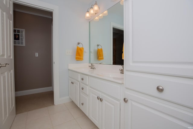 9076 Halston Cir, Newburgh, IN 47630 - full bathroom with double vanity, tile patterned floors, and baseboards