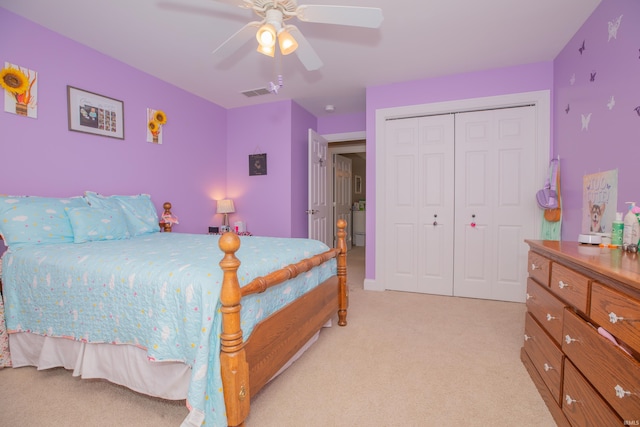 9076 Halston Cir, Newburgh, IN 47630 - bedroom with light colored carpet, a closet, and ceiling fan