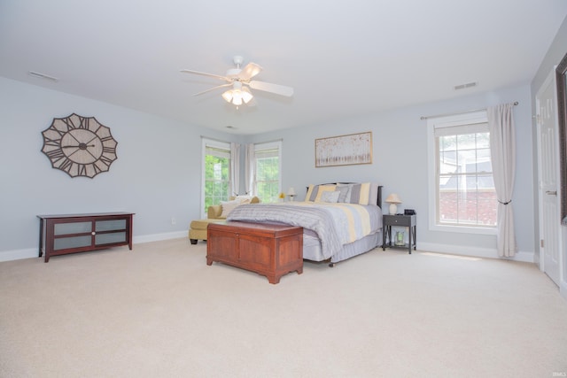9076 Halston Cir, Newburgh, IN 47630 - bedroom with light carpet, baseboards, and ceiling fan