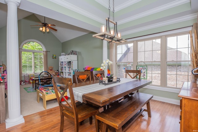 9076 Halston Cir, Newburgh, IN 47630 - dining area featuring decorative columns, light wood-style floors, ceiling fan, crown molding, and a chandelier