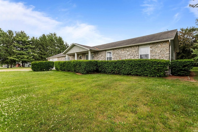 9391 E 100 N, Greentown, IN 46936 - view of front of home featuring stone siding and a front yard