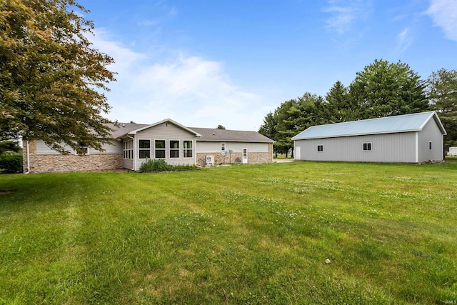 9391 E 100 N, Greentown, IN 46936 - view of grassy yard featuring a pole building and an outbuilding
