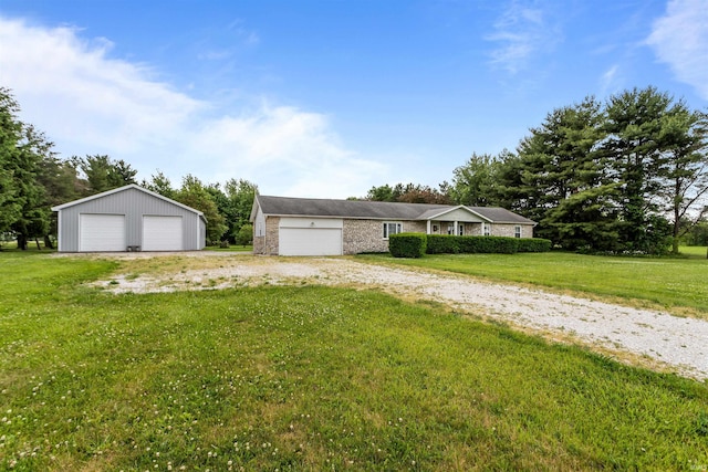 9391 E 100 N, Greentown, IN 46936 - single story home featuring a detached garage, a front lawn, and an outbuilding