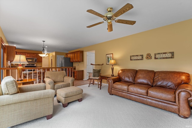 17813 Bromley Chase, South Bend, IN 46614 - living area featuring ceiling fan and light carpet