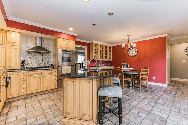 8804 W Tulip Tree Dr, Muncie, IN 47304 - kitchen featuring wall chimney exhaust hood, a sink, stainless steel double oven, baseboards, and a breakfast bar area