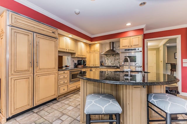 8804 W Tulip Tree Dr, Muncie, IN 47304 - kitchen featuring wall chimney exhaust hood, a sink, a kitchen breakfast bar, built in appliances, and an island with sink