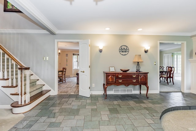 8804 W Tulip Tree Dr, Muncie, IN 47304 - entryway featuring crown molding, stairway, healthy amount of natural light, stone tile floors, and recessed lighting