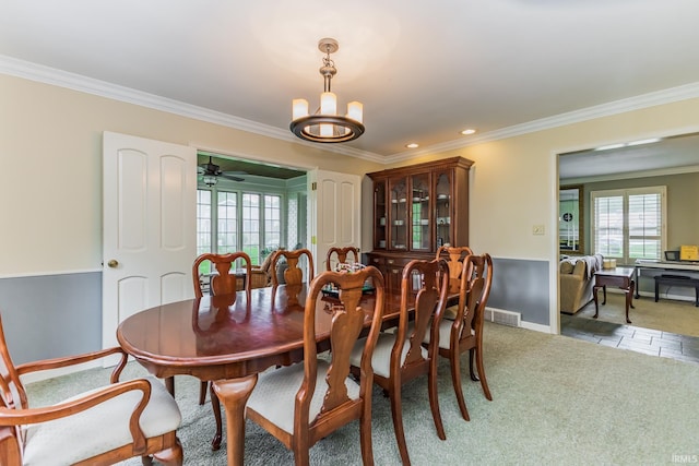 8804 W Tulip Tree Dr, Muncie, IN 47304 - dining space featuring light colored carpet, ornamental molding, a chandelier, baseboards, and recessed lighting