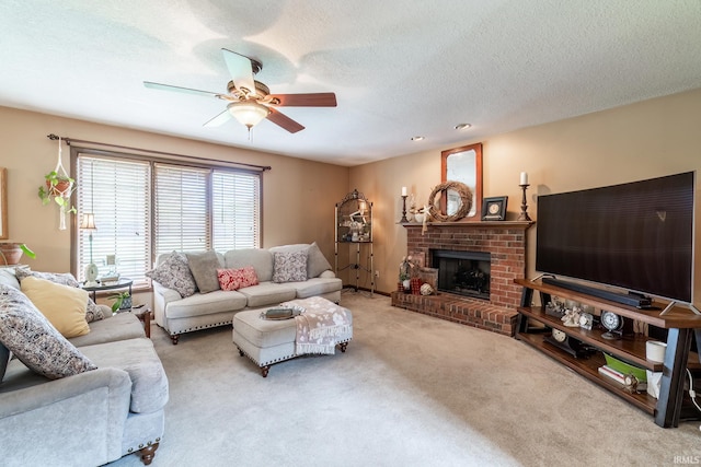 15329 Laurel Ridge Pl, Leo, IN 46765 - carpeted living area with a ceiling fan, a fireplace, and a textured ceiling