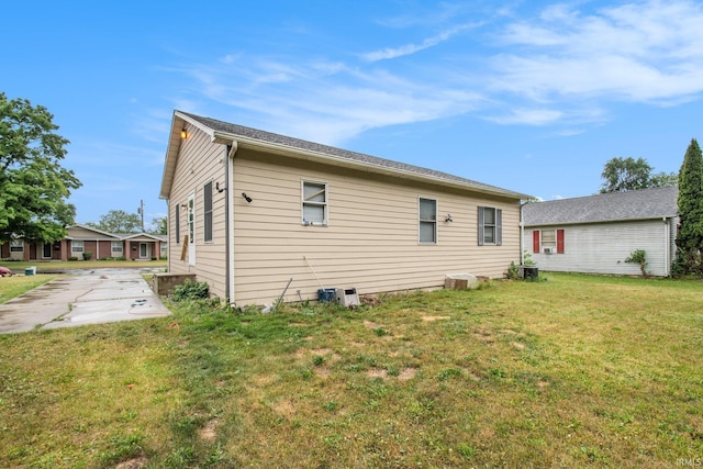 1849 N Meade St, South Bend, IN 46628 - back of house featuring a lawn