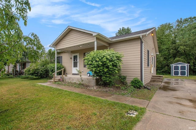 1849 N Meade St, South Bend, IN 46628 - view of front facade featuring a front yard and driveway