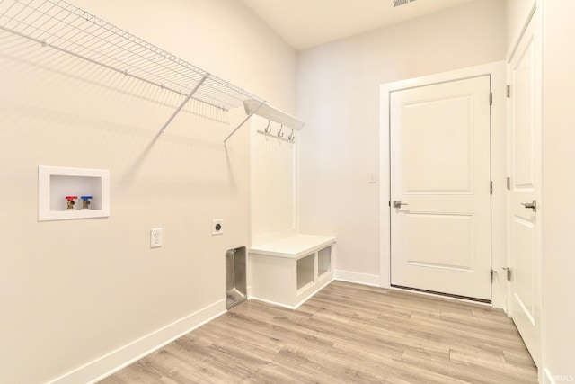 5708 Abbe Wood Dr, Newburgh, IN 47630 - washroom featuring electric dryer hookup, light wood finished floors, washer hookup, and baseboards