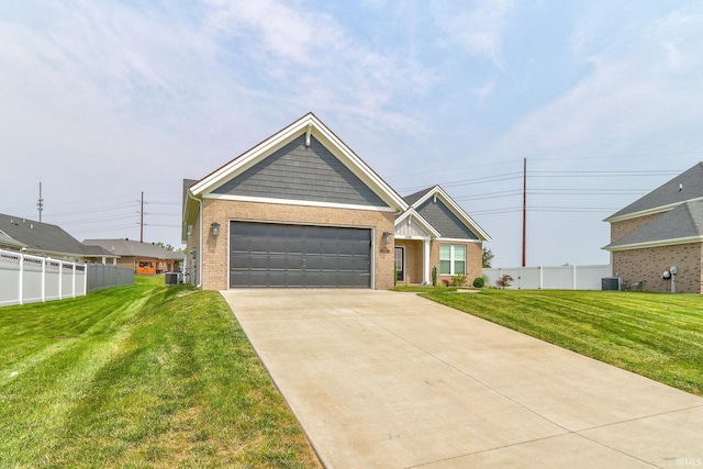 5708 Abbe Wood Dr, Newburgh, IN 47630 - view of front of property featuring brick siding, central air condition unit, concrete driveway, and a garage