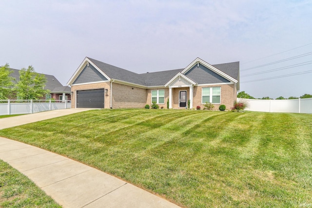 5708 Abbe Wood Dr, Newburgh, IN 47630 - view of front of home with brick siding, driveway, and an attached garage