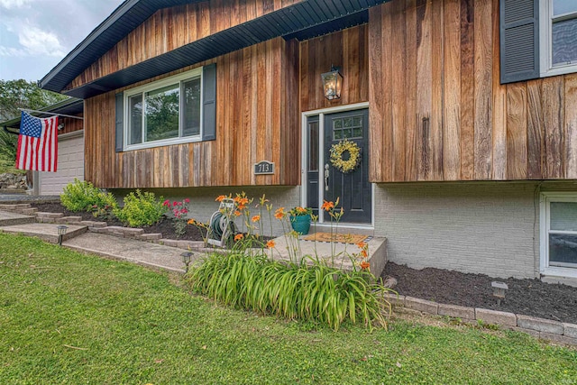 713 Carole Pl, Newburgh, IN 47630 - view of exterior entry with a yard