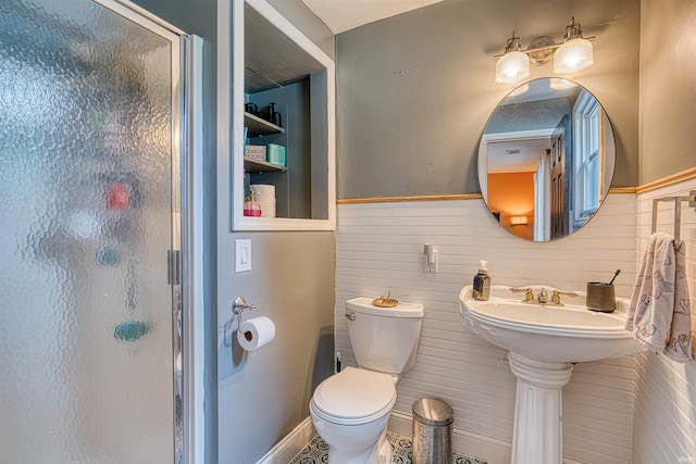 713 Carole Pl, Newburgh, IN 47630 - bathroom with a stall shower, toilet, wood walls, and a wainscoted wall