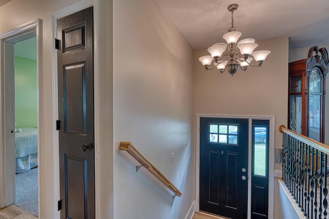 713 Carole Pl, Newburgh, IN 47630 - entryway featuring a chandelier and baseboards