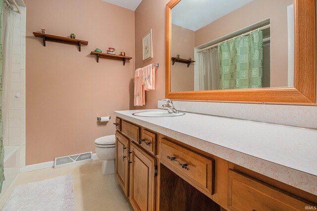 26966 Heather Ln, Elkhart, IN 46514 - full bath with toilet, vanity, and baseboards