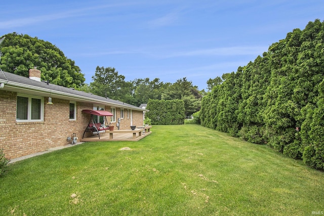 26966 Heather Ln, Elkhart, IN 46514 - view of green lawn with a patio