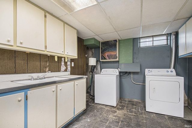 519 W 12th St, Mishawaka, IN 46544 - laundry area featuring cabinet space and washing machine and clothes dryer