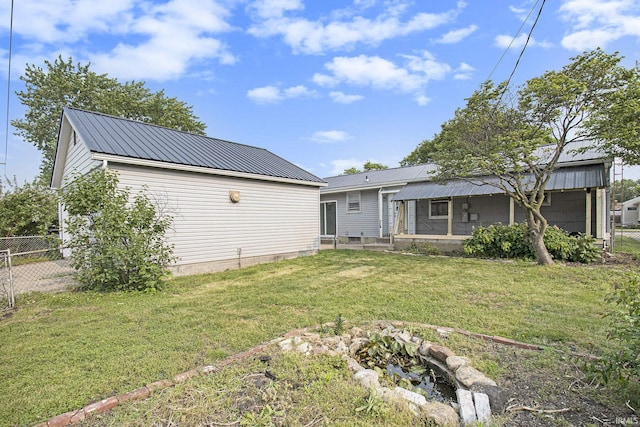 519 W 12th St, Mishawaka, IN 46544 - rear view of house featuring metal roof