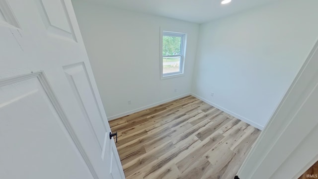 30050 Wren St, Elkhart, IN 46517 - unfurnished bedroom with light wood-style flooring, recessed lighting, and baseboards