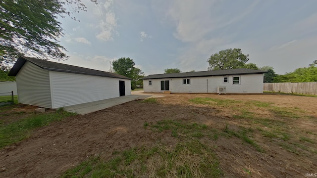 30050 Wren St, Elkhart, IN 46517 - rear view of house with a patio area and an outbuilding