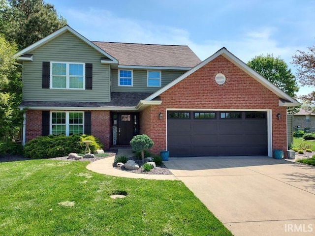 394 Saint Charles St, Jasper, IN 47546 - traditional-style house with concrete driveway, an attached garage, a front yard, brick siding, and roof with shingles