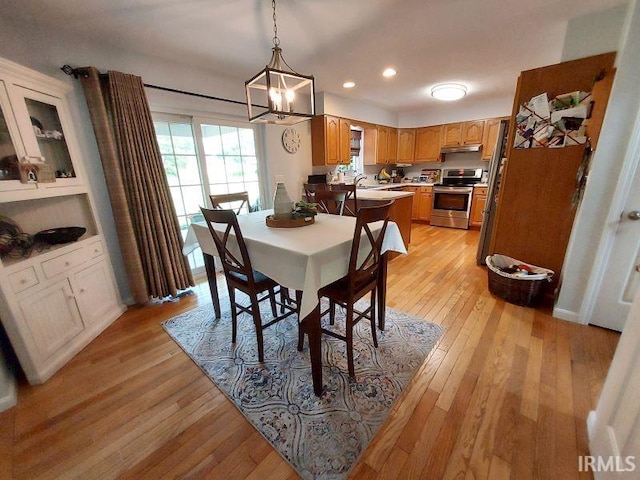 394 Saint Charles St, Jasper, IN 47546 - dining space featuring light wood finished floors, recessed lighting, and a chandelier