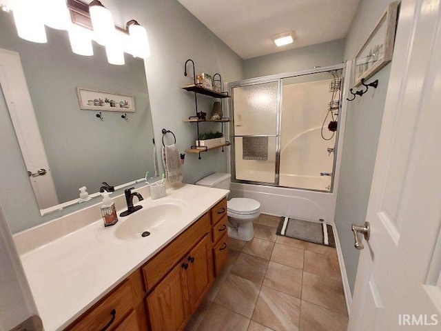 394 Saint Charles St, Jasper, IN 47546 - full bath featuring vanity, toilet, tile patterned floors, and enclosed tub / shower combo