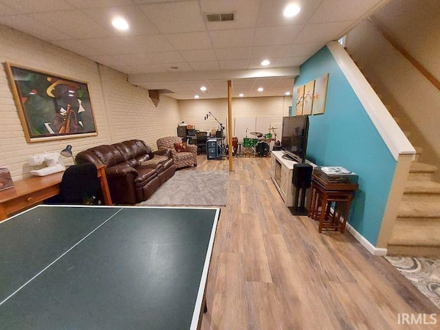 394 Saint Charles St, Jasper, IN 47546 - playroom with wood finished floors, baseboards, recessed lighting, and a drop ceiling