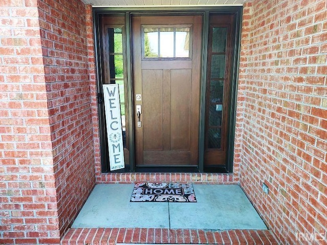 394 Saint Charles St, Jasper, IN 47546 - entrance to property featuring brick siding