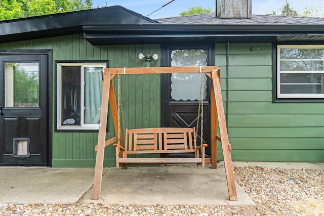 332 W Tyland Blvd, New Haven, IN 46774 - entrance to property with roof with shingles and a chimney