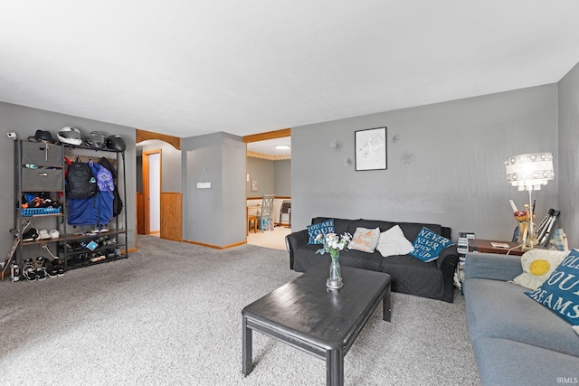 332 W Tyland Blvd, New Haven, IN 46774 - carpeted living room featuring arched walkways and baseboards