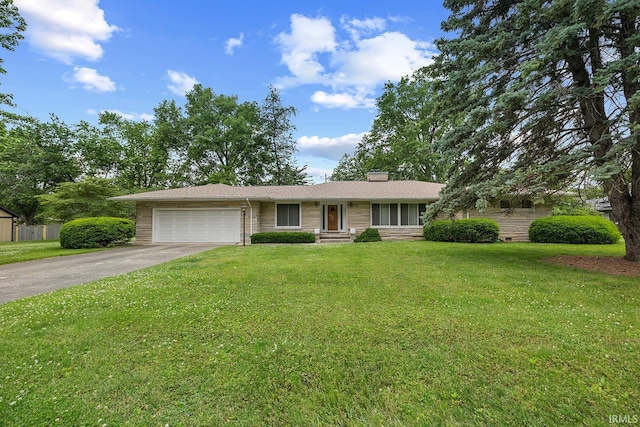 14 Brady Ct, Lafayette, IN 47909 - single story home featuring an attached garage, asphalt driveway, a chimney, and a front yard