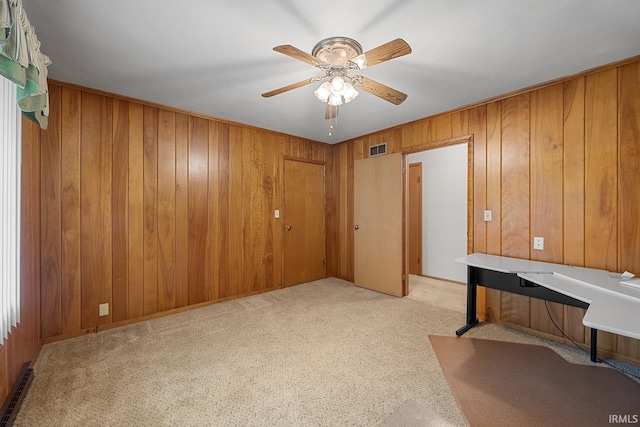 14 Brady Ct, Lafayette, IN 47909 - unfurnished office featuring light carpet, wood walls, a ceiling fan, and baseboard heating