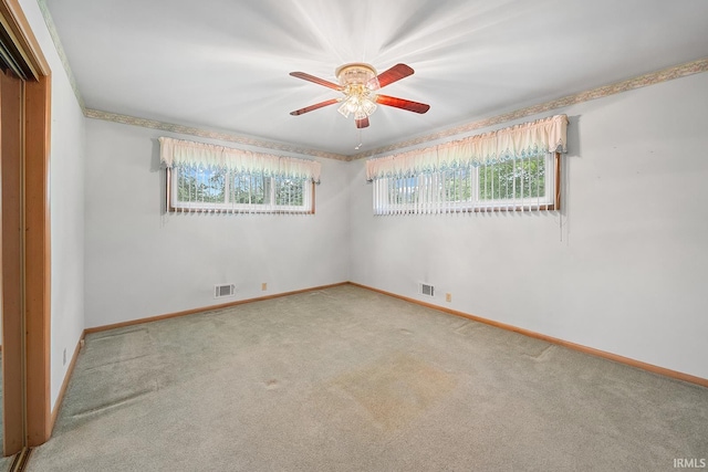 14 Brady Ct, Lafayette, IN 47909 - empty room with a ceiling fan, carpet flooring, and baseboards