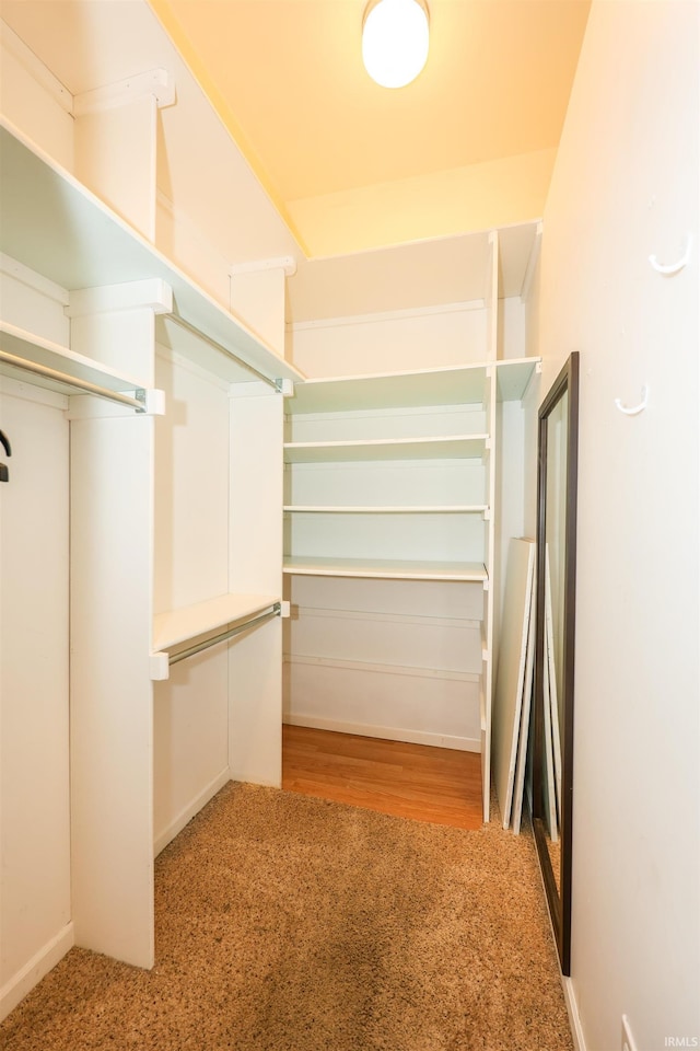 17111 Antwerp Rd, Harlan, IN 46743 - walk in closet featuring wood finished floors