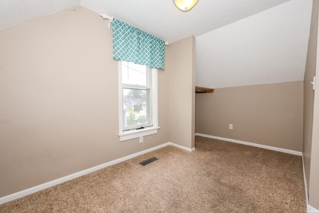 17111 Antwerp Rd, Harlan, IN 46743 - additional living space featuring carpet, lofted ceiling, and baseboards