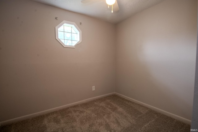 400 S Main St, Knox, IN 46534 - unfurnished room featuring carpet flooring, a ceiling fan, and baseboards